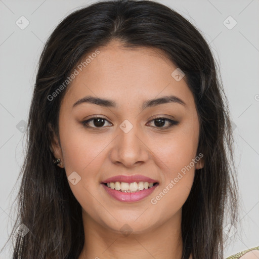 Joyful latino young-adult female with long  brown hair and brown eyes