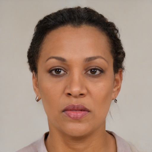 Neutral black adult female with short  brown hair and brown eyes