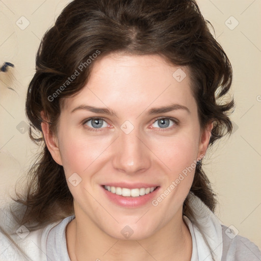 Joyful white young-adult female with medium  brown hair and blue eyes