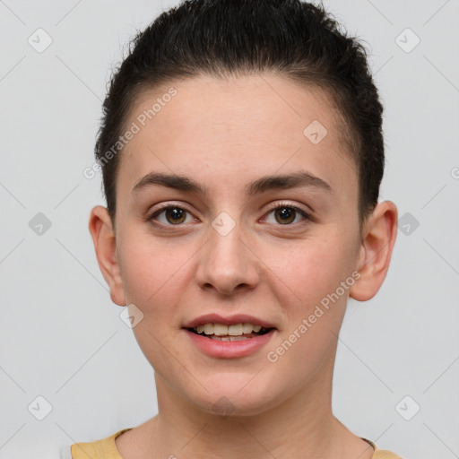 Joyful white young-adult female with short  brown hair and grey eyes