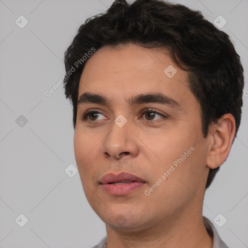 Neutral white young-adult male with short  black hair and brown eyes