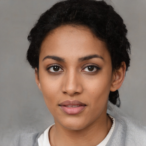 Neutral latino young-adult female with short  black hair and brown eyes