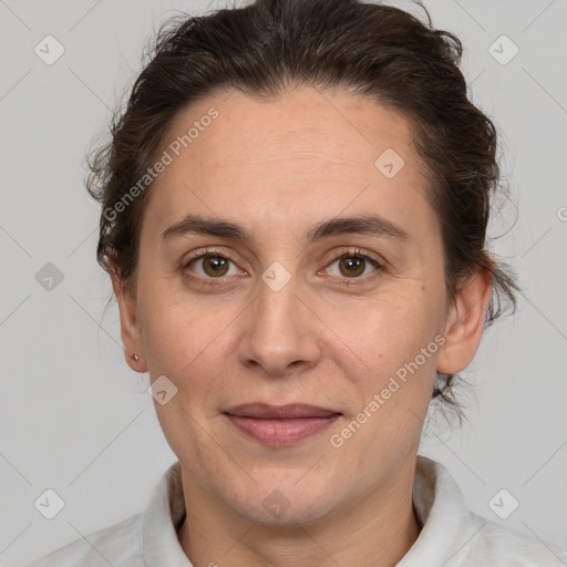 Joyful white adult female with short  brown hair and brown eyes