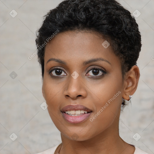 Joyful black young-adult female with short  brown hair and brown eyes