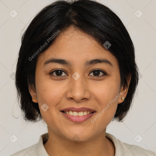 Joyful asian young-adult female with medium  brown hair and brown eyes