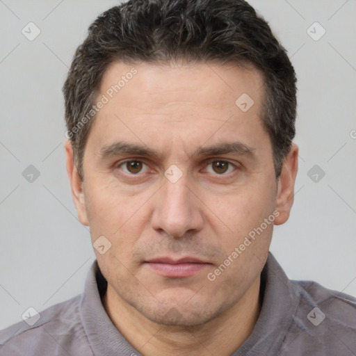 Neutral white adult male with short  brown hair and brown eyes