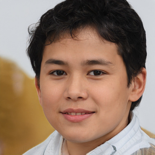 Joyful asian child male with medium  brown hair and brown eyes