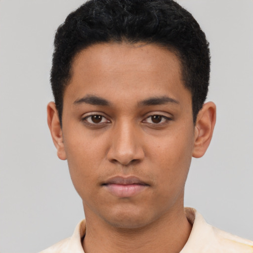 Neutral latino young-adult male with short  black hair and brown eyes