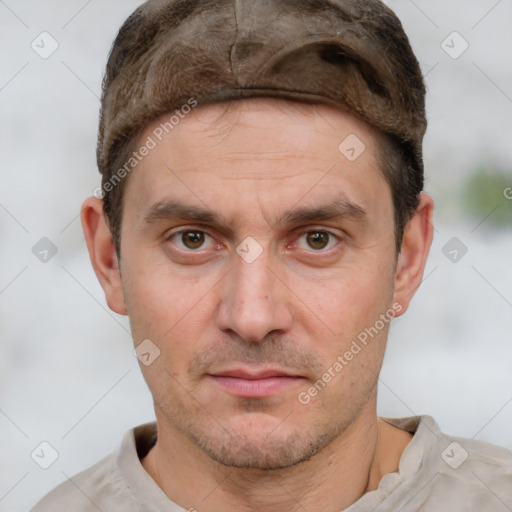 Neutral white adult male with short  brown hair and brown eyes