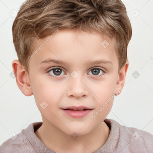 Joyful white child male with short  brown hair and grey eyes