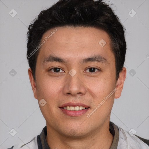 Joyful white young-adult male with short  black hair and brown eyes