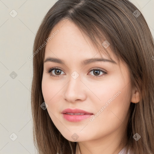 Neutral white young-adult female with long  brown hair and brown eyes