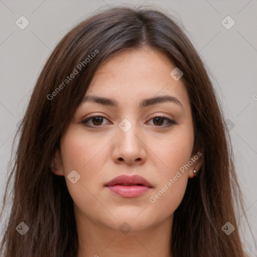 Neutral white young-adult female with long  brown hair and brown eyes