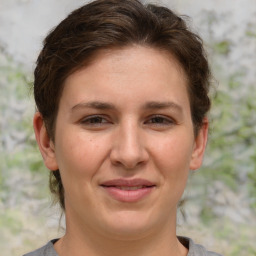 Joyful white adult female with medium  brown hair and grey eyes