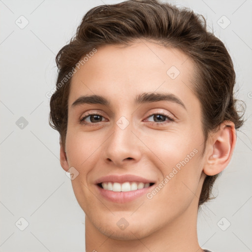 Joyful white young-adult female with short  brown hair and brown eyes