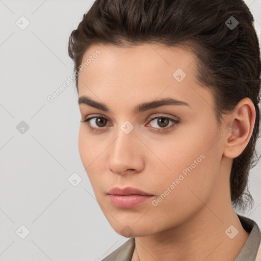 Neutral white young-adult female with short  brown hair and brown eyes