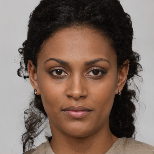 Neutral black young-adult female with medium  black hair and brown eyes