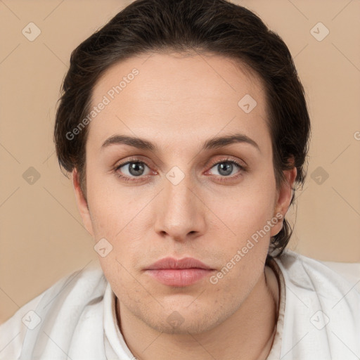 Neutral white young-adult female with short  brown hair and brown eyes