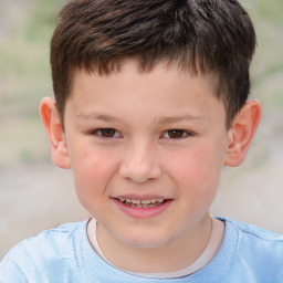 Joyful white child male with short  brown hair and brown eyes