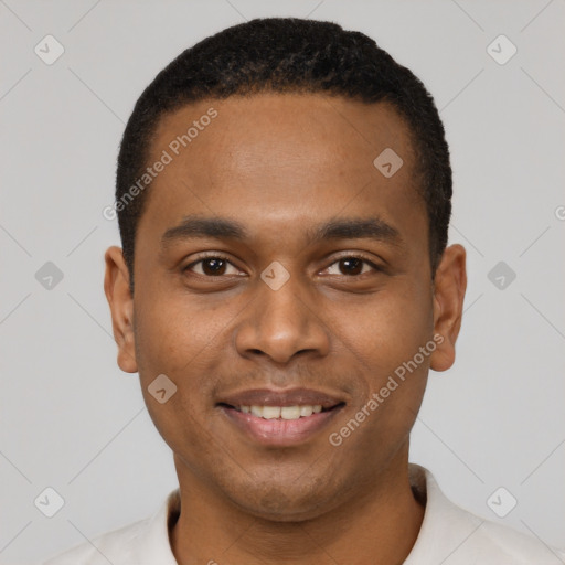 Joyful black young-adult male with short  black hair and brown eyes