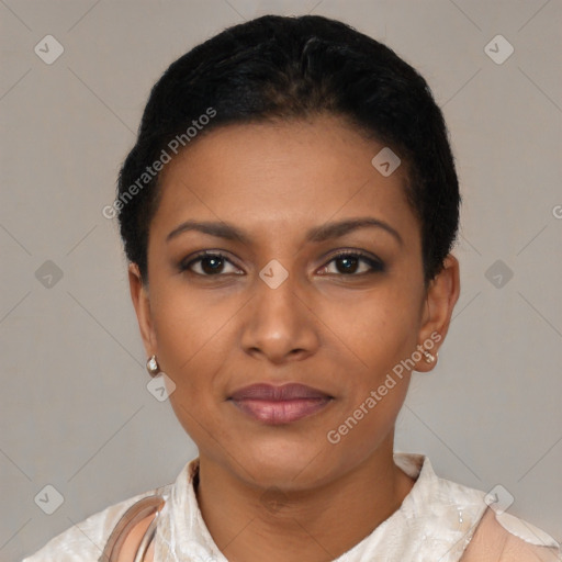 Joyful latino young-adult female with short  black hair and brown eyes
