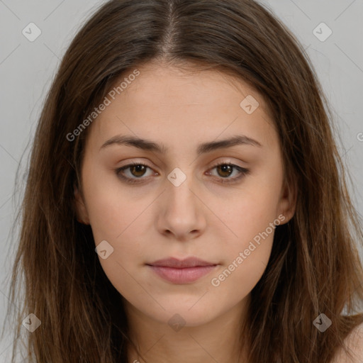 Neutral white young-adult female with long  brown hair and brown eyes