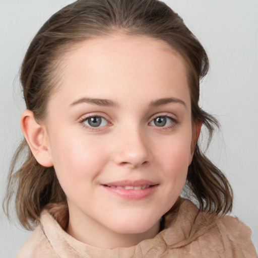 Joyful white child female with medium  brown hair and grey eyes