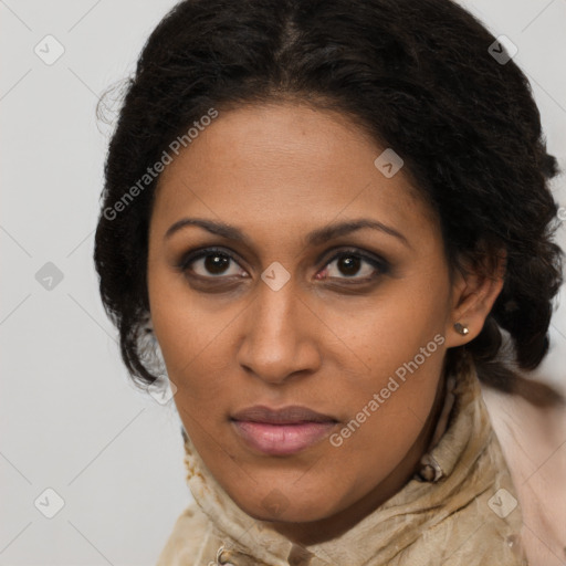 Joyful black young-adult female with long  brown hair and brown eyes