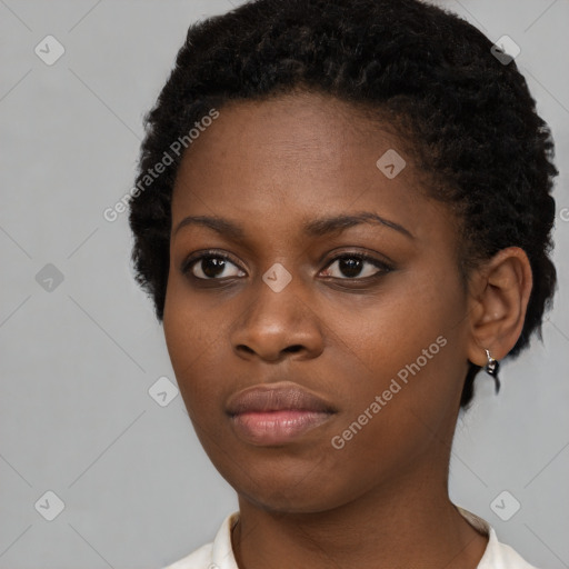 Neutral black young-adult female with short  black hair and brown eyes