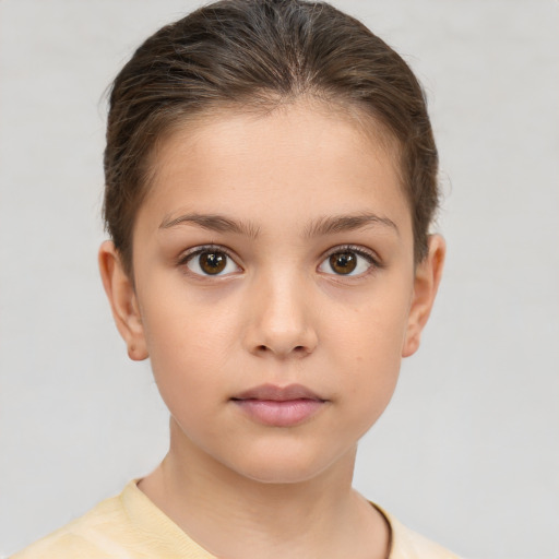 Neutral white child female with short  brown hair and brown eyes