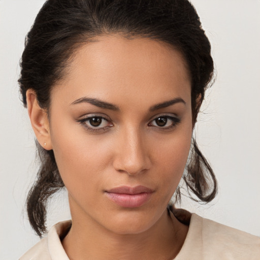 Neutral white young-adult female with medium  brown hair and brown eyes