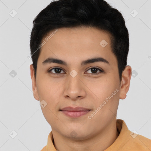 Joyful latino young-adult male with short  brown hair and brown eyes