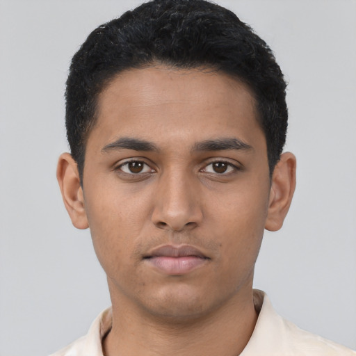 Neutral latino young-adult male with short  black hair and brown eyes