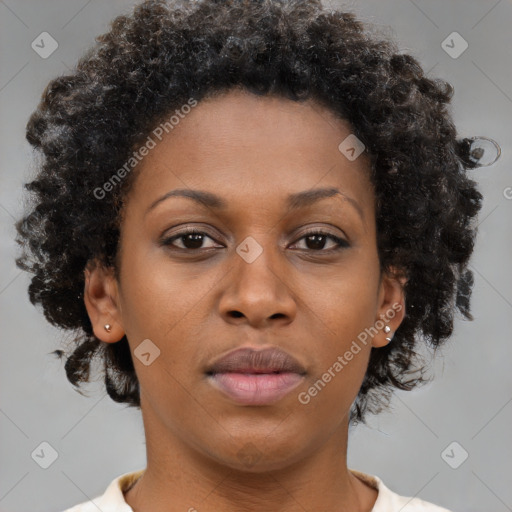 Neutral black young-adult female with short  brown hair and brown eyes