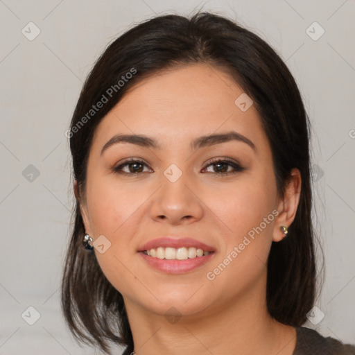 Joyful white young-adult female with medium  brown hair and brown eyes