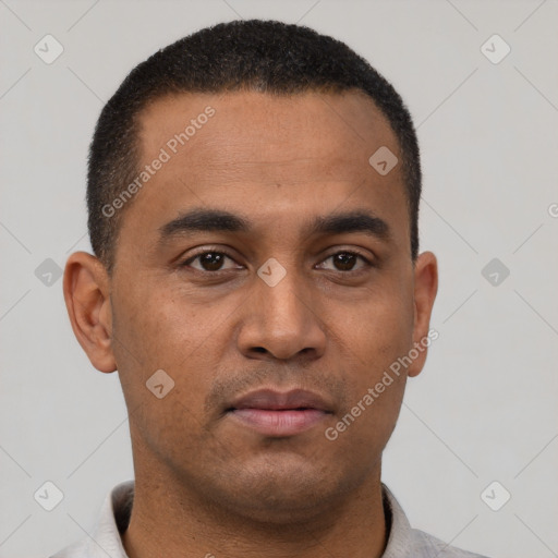 Neutral latino young-adult male with short  black hair and brown eyes