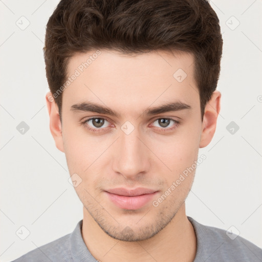 Neutral white young-adult male with short  brown hair and brown eyes