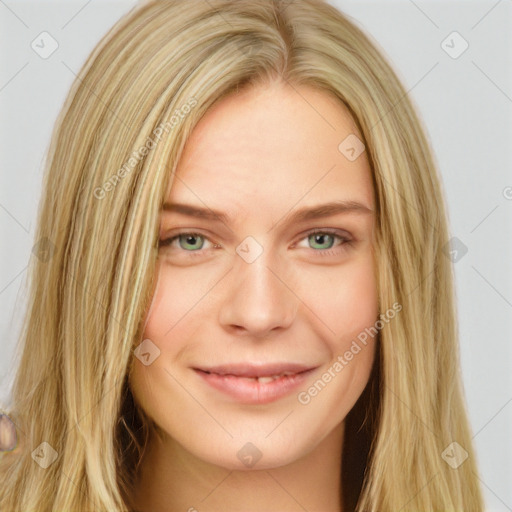 Joyful white young-adult female with long  brown hair and green eyes