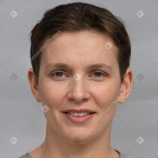 Joyful white young-adult female with short  brown hair and grey eyes