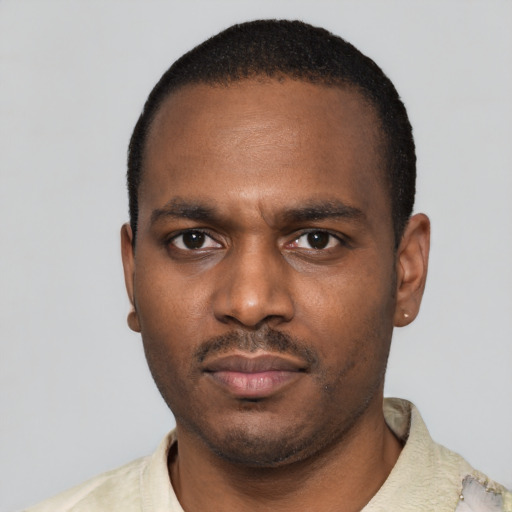 Neutral black young-adult male with short  black hair and brown eyes