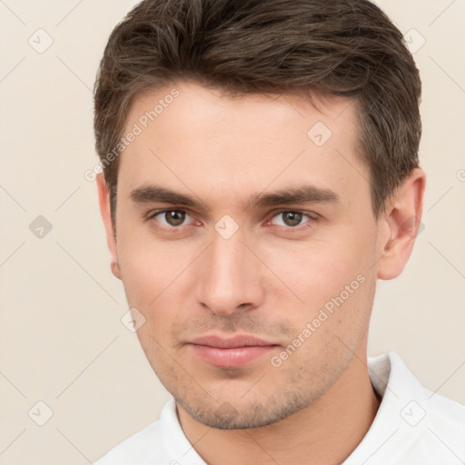 Neutral white young-adult male with short  brown hair and brown eyes