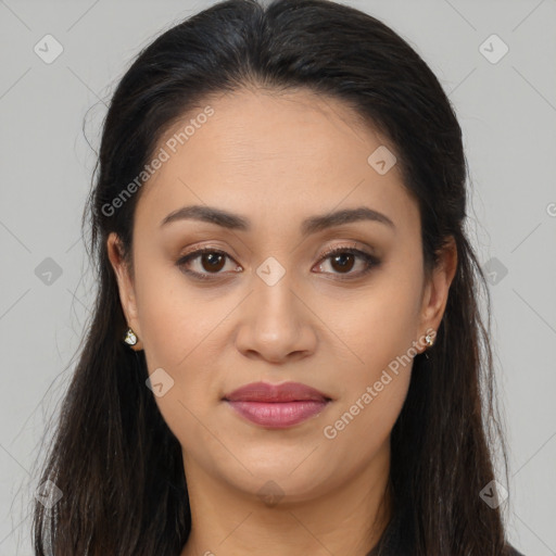 Joyful latino young-adult female with long  brown hair and brown eyes