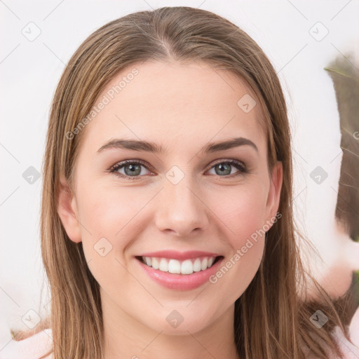 Joyful white young-adult female with long  brown hair and green eyes