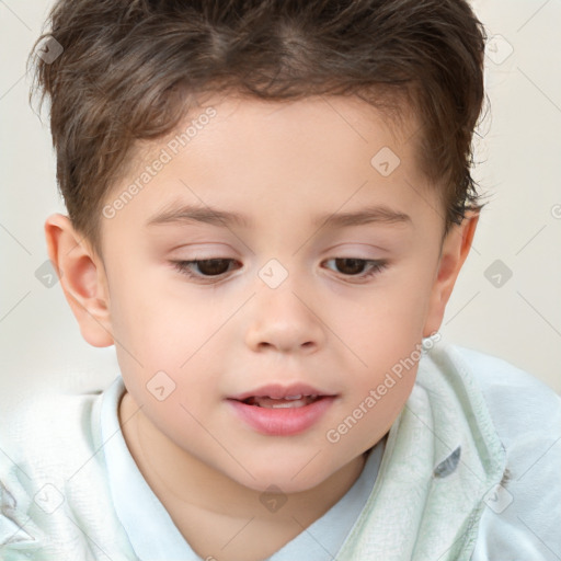 Joyful white child male with short  brown hair and brown eyes