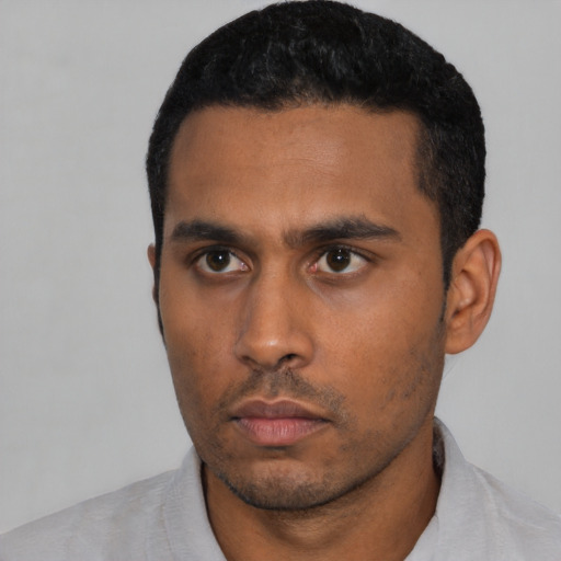 Neutral latino young-adult male with short  black hair and brown eyes