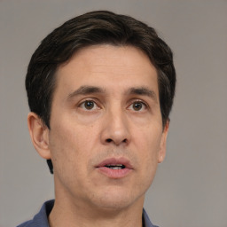 Neutral white adult male with short  brown hair and brown eyes