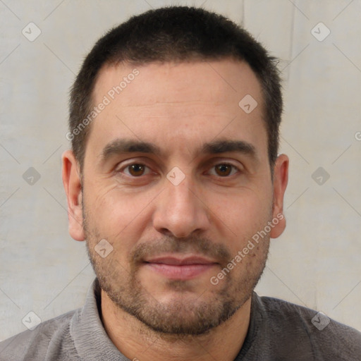 Joyful white adult male with short  brown hair and brown eyes