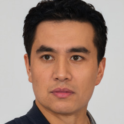 Neutral asian young-adult male with short  black hair and brown eyes