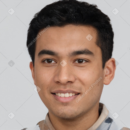 Joyful latino young-adult male with short  black hair and brown eyes