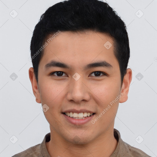 Joyful white young-adult male with short  black hair and brown eyes